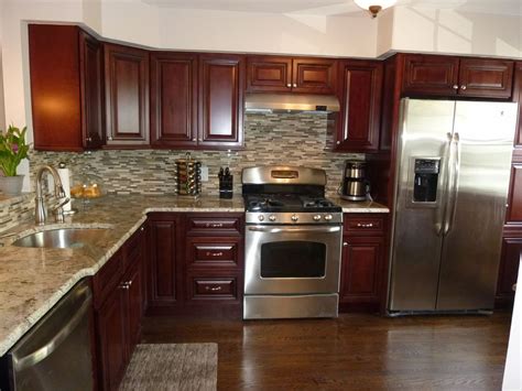 stainless steel appliances with mahogany cabinets|appliances with white cabinets.